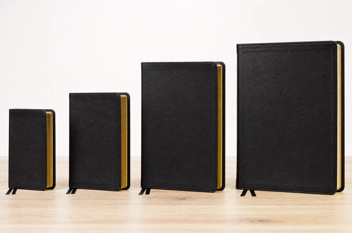 Size comparison of compact, personal, standard, and large print Bibles side by side