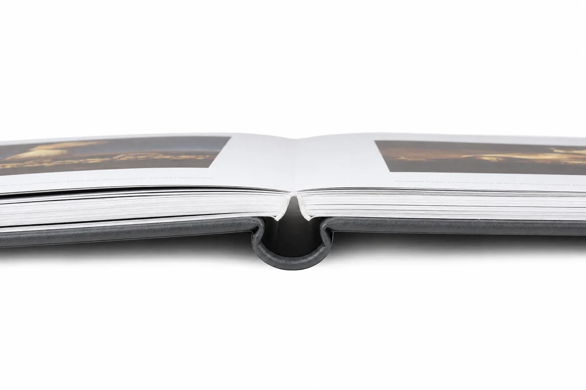 Lay flat hardcover book showing the hollow spine construction and 180-degree opening
